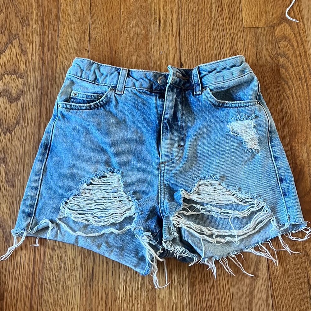 Topshop denim shorts, Small. rips on the front!